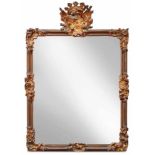 Large rococo wall mirrorGermany, 2nd half 18th c.The high rectangular, profiled frame at corners and