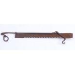 Trammel hook18th centuryWrought iron. L. 90 cm. - Corroded.Kaminsäge18. Jh.Schmiedeeisen. L. 90