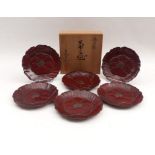 Six small, flower-shaped platesJapan, 20th C.Wood, carved relief, red-brown lacquer (Kamakura-bori).