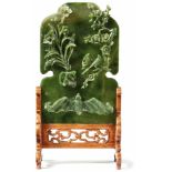 Table screen with jade panelChina, late Qing Dynasty - around 1900/1920Plate with curved outline and