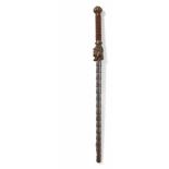 Mallet with dragon headChinaFour-sided whip leg modelled on the Ming Dynasty. Iron and bronze,