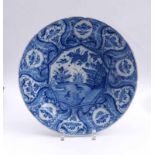 Large plate with duck pondDelft, 18th century.Round, recessed form with narrow rim, ten-cornered