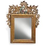Rococo giltwood mirrorMid 18th C.Conifer wood. 83 x 67 cm. - Signs of age.RokokospiegelM. 18. Jh.