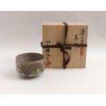 Tea bowl with dragon(Chawan)Japan, 20th C.Han-Zutsu-form. Shino ceramic. Blue signature,