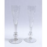 Two glassesBohemia, around 1900Disc foot, short hollow baluster, conical cuppa, one with flowering