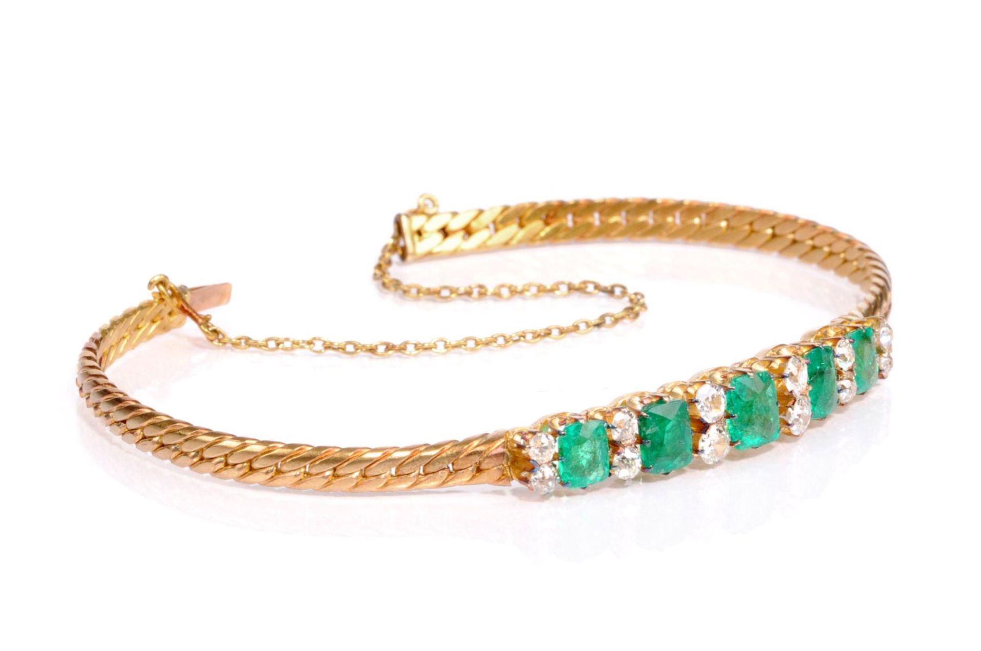 Armband mit fünf Smaragden und zwölf Diamanten. Um 1910/1920.18K Gelbgold, ungemarkt.
