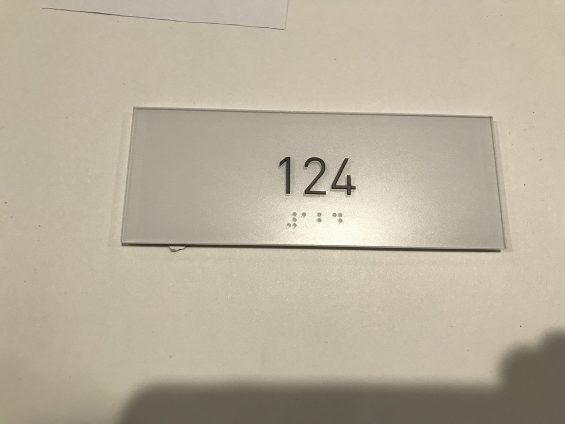 Suite Number Sign #124 , Dim. 6 in x 2 1/2 in , Location: Suite Level 100 ***Note from