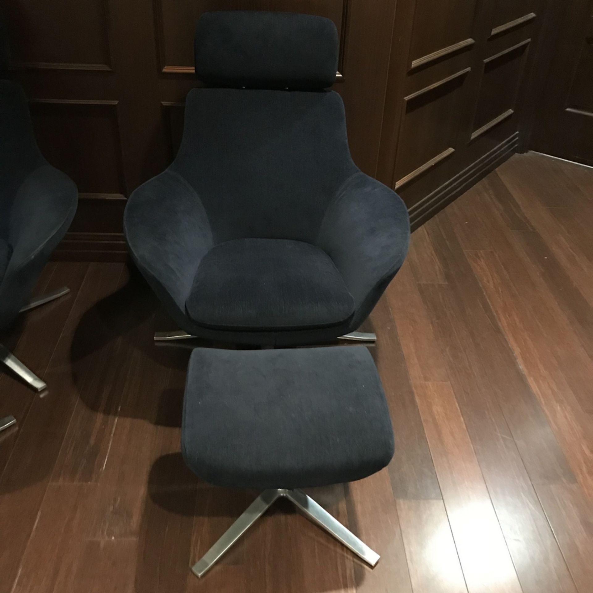 Lounging Chair and Ottoman , Dim. 41 h x 35 w , Location: Players Lounge ***Note from Auctioneer***