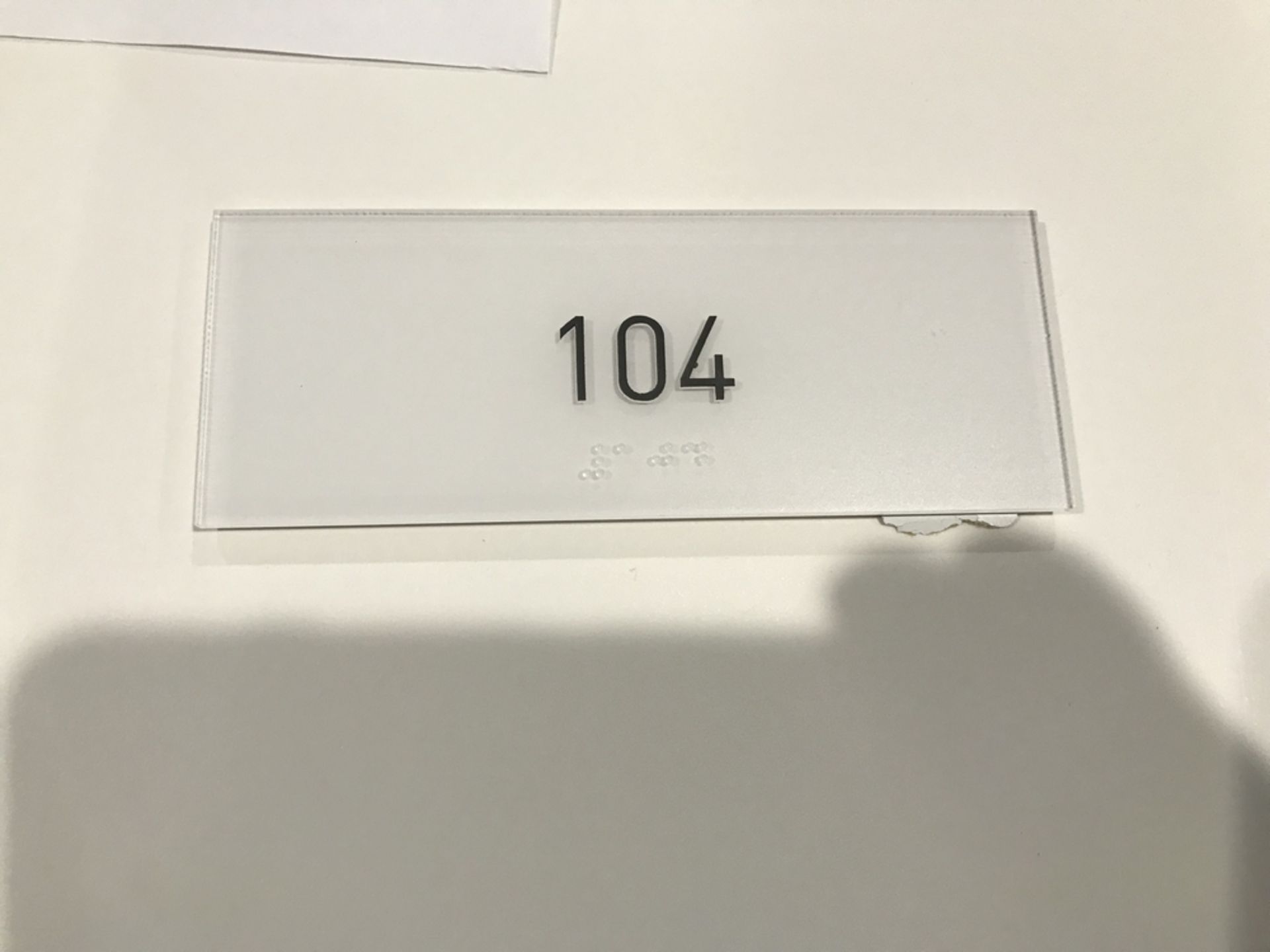 Suite Number Sign #104 , Dim. 6 in x 2 1/2 in , Location: Suite Level 100 ***Note from