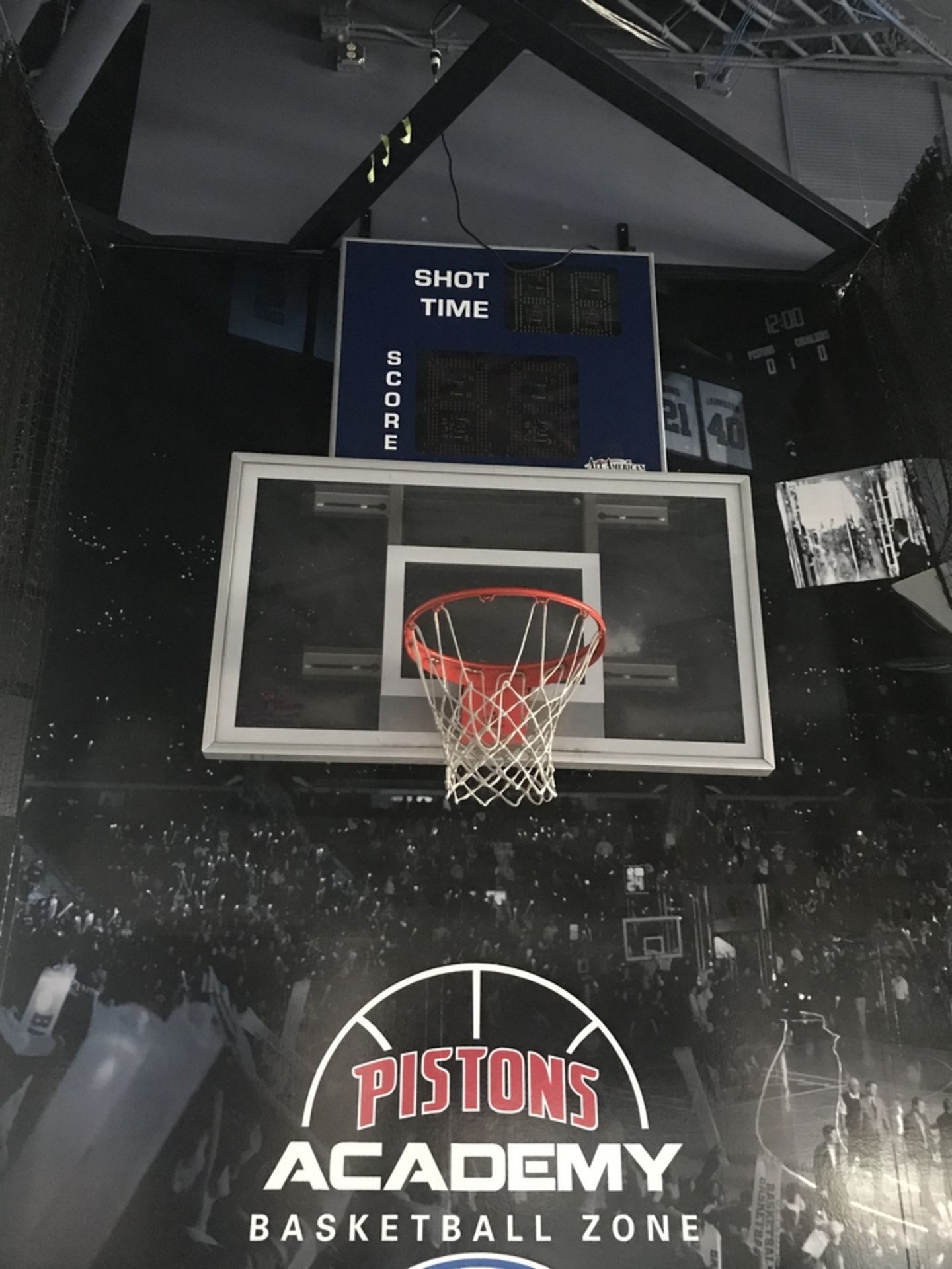 Backboard, Hoop & Shot Clock from Kids Shooting Area in Concourse , Dim. , Location: Concourse ***