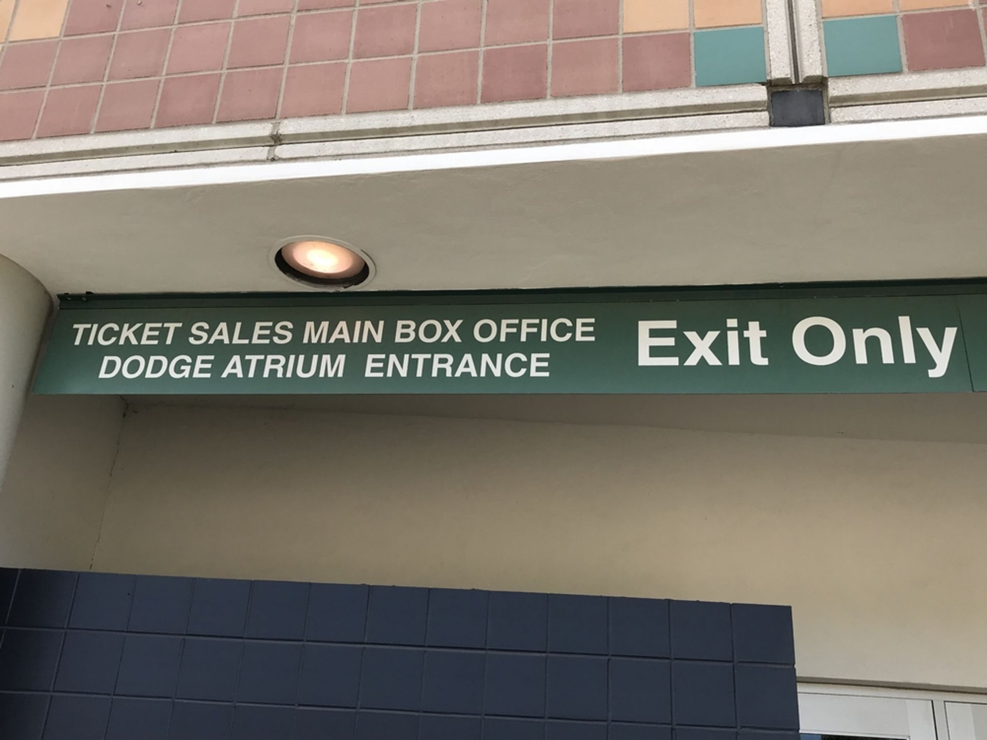 "Ticket Sales Main Box Office Dodge Atrium Entrance" Sign , Dim. 119 in x 15 in , Location: East