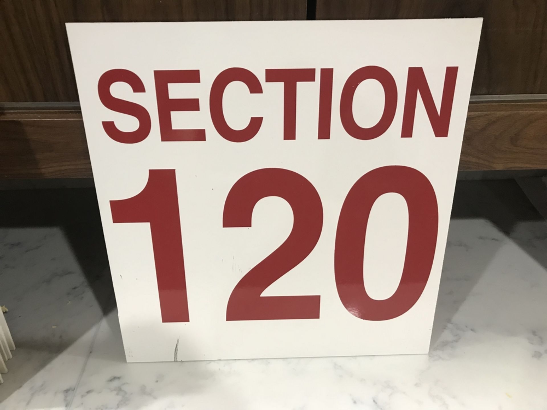 "Section 120" Sign , Dim. 16 in x 16 in , Location: Arena Seating ***Note from Auctioneer***This lot