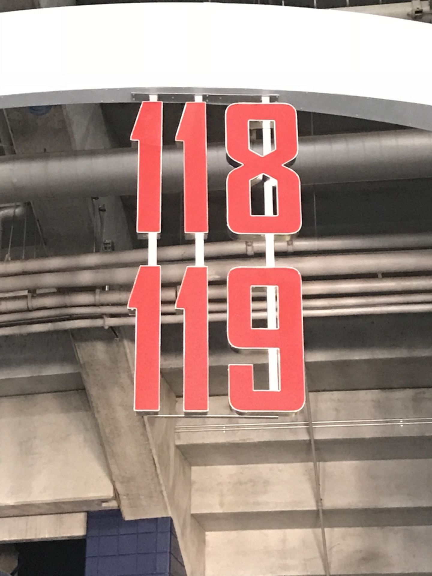 Section Sign Lighted "118-119" , Dim. 34 in x 68 in , Location: Concourse ***Note from