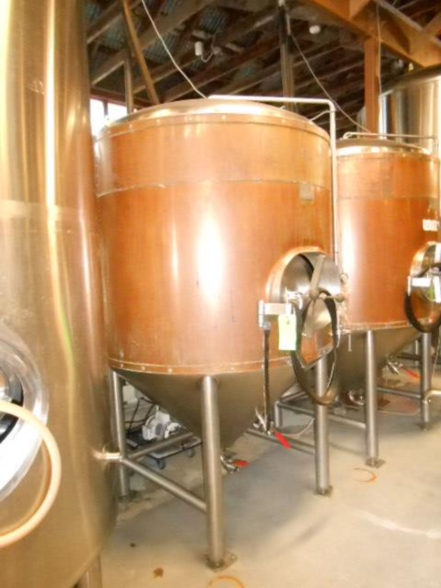 The Pub Brewing Company stainless steel glycol jacket 15 bbl. fermenter tank insulated with copper