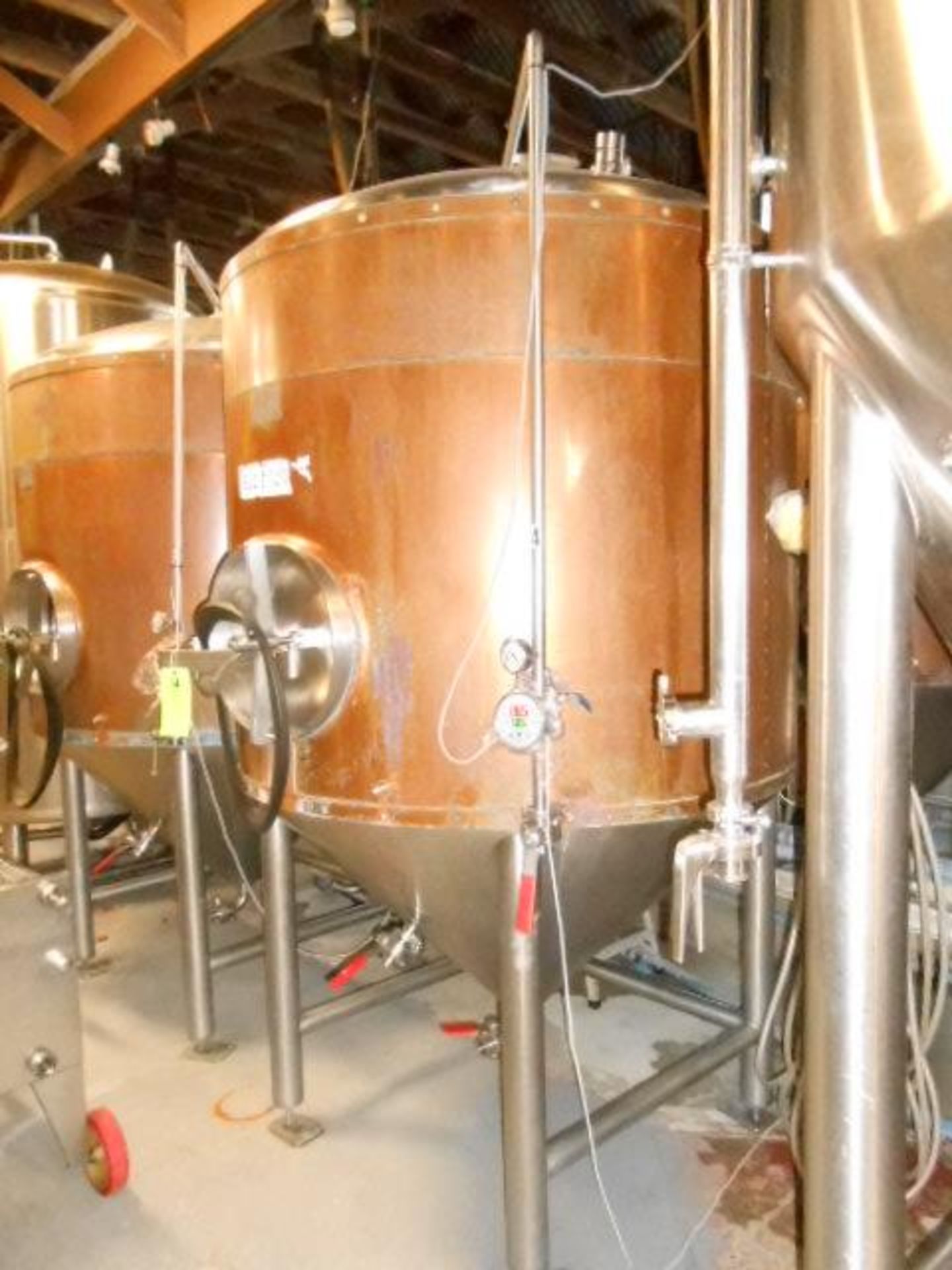 The Pub Brewing Company stainless steel glycol jacket 15 bbl. fermenter tank insulated with copper