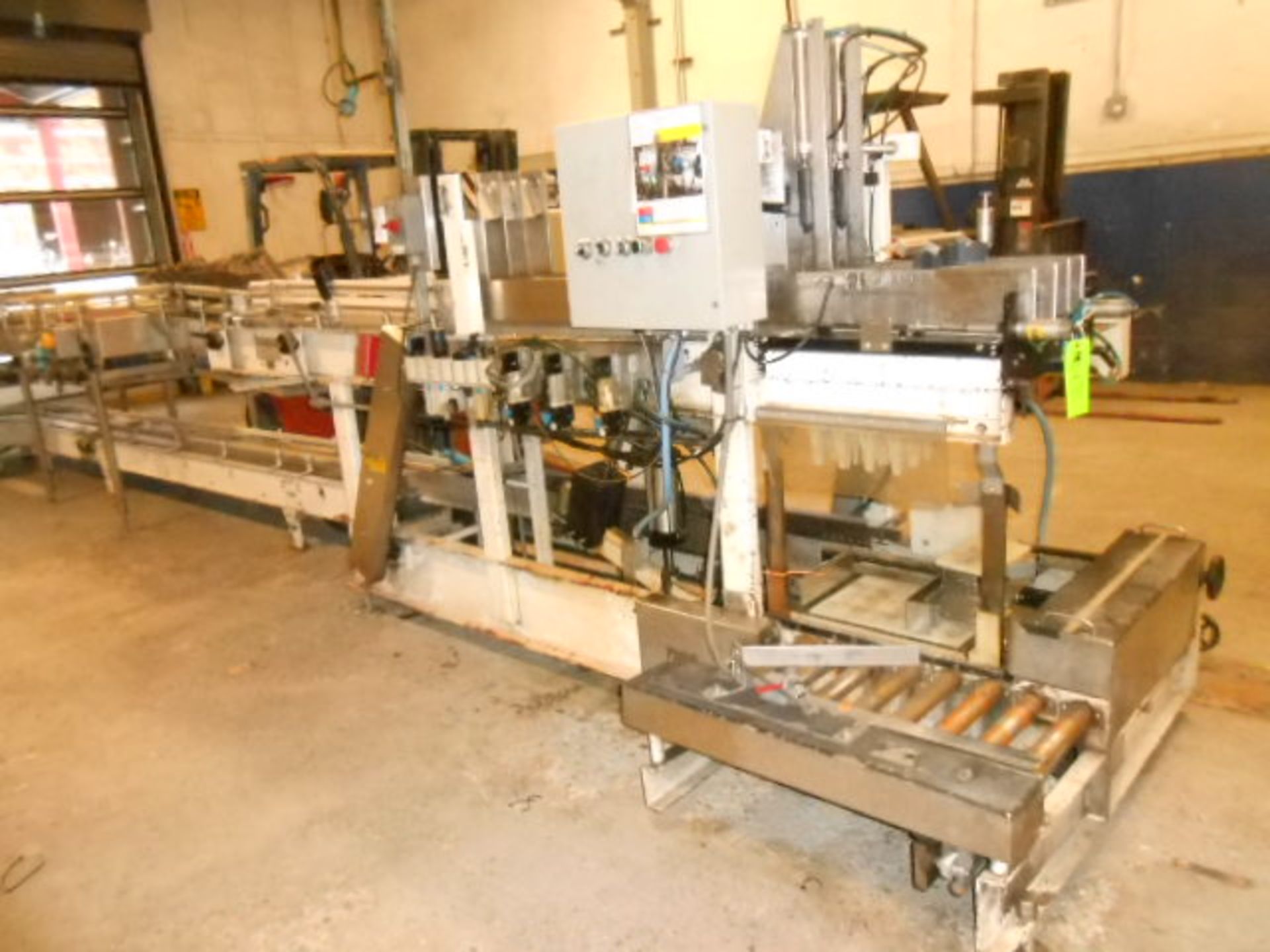 Hartness drop packer, Serial 488 for 12 oz and 22 oz bottle __LOCATED: MAIN CIDERY CP-1C AREA