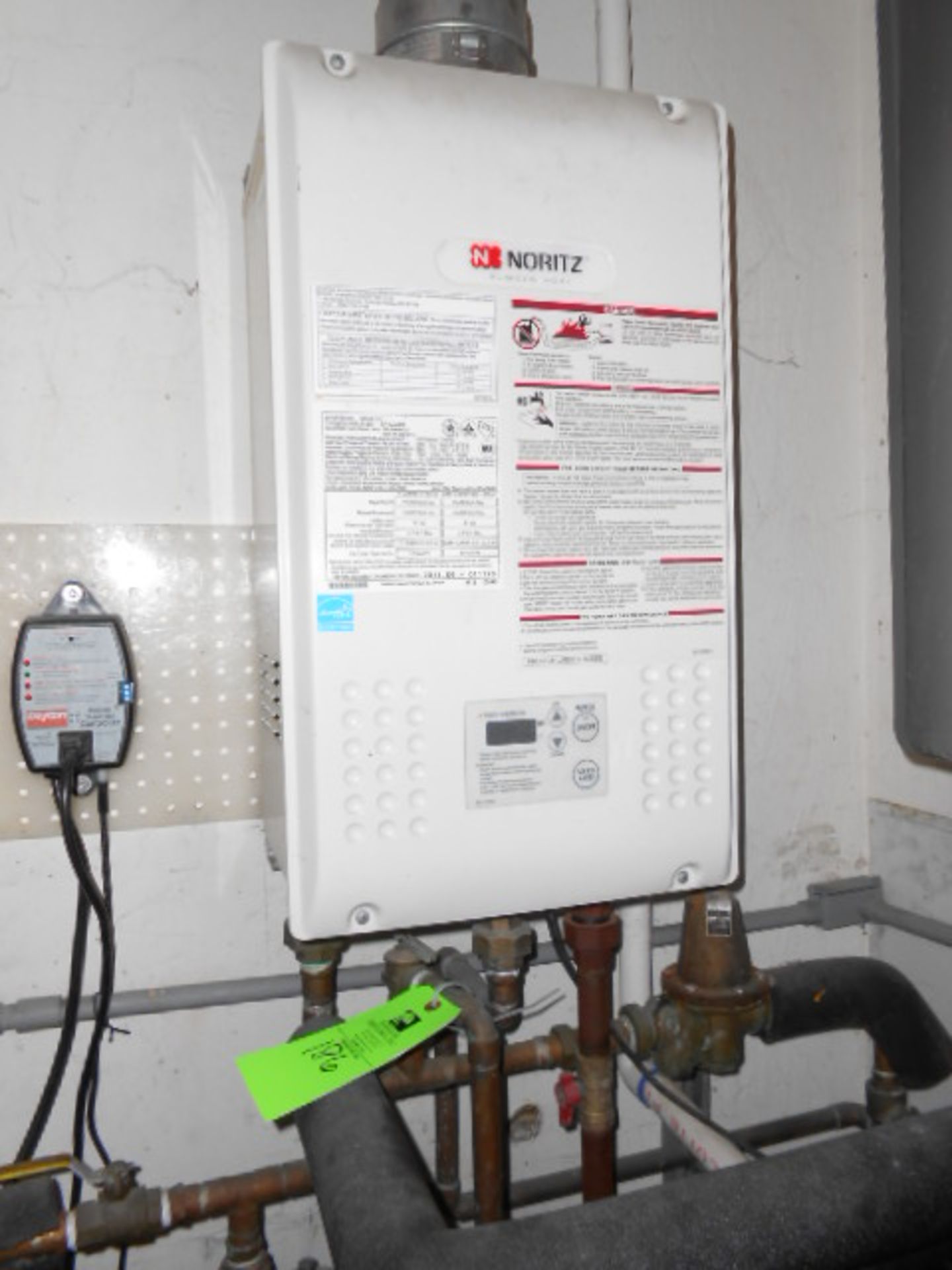 Noritz gas tankless water heater, model NR98-DVC, includes spare parts on hand NOTE: CURRENTLY