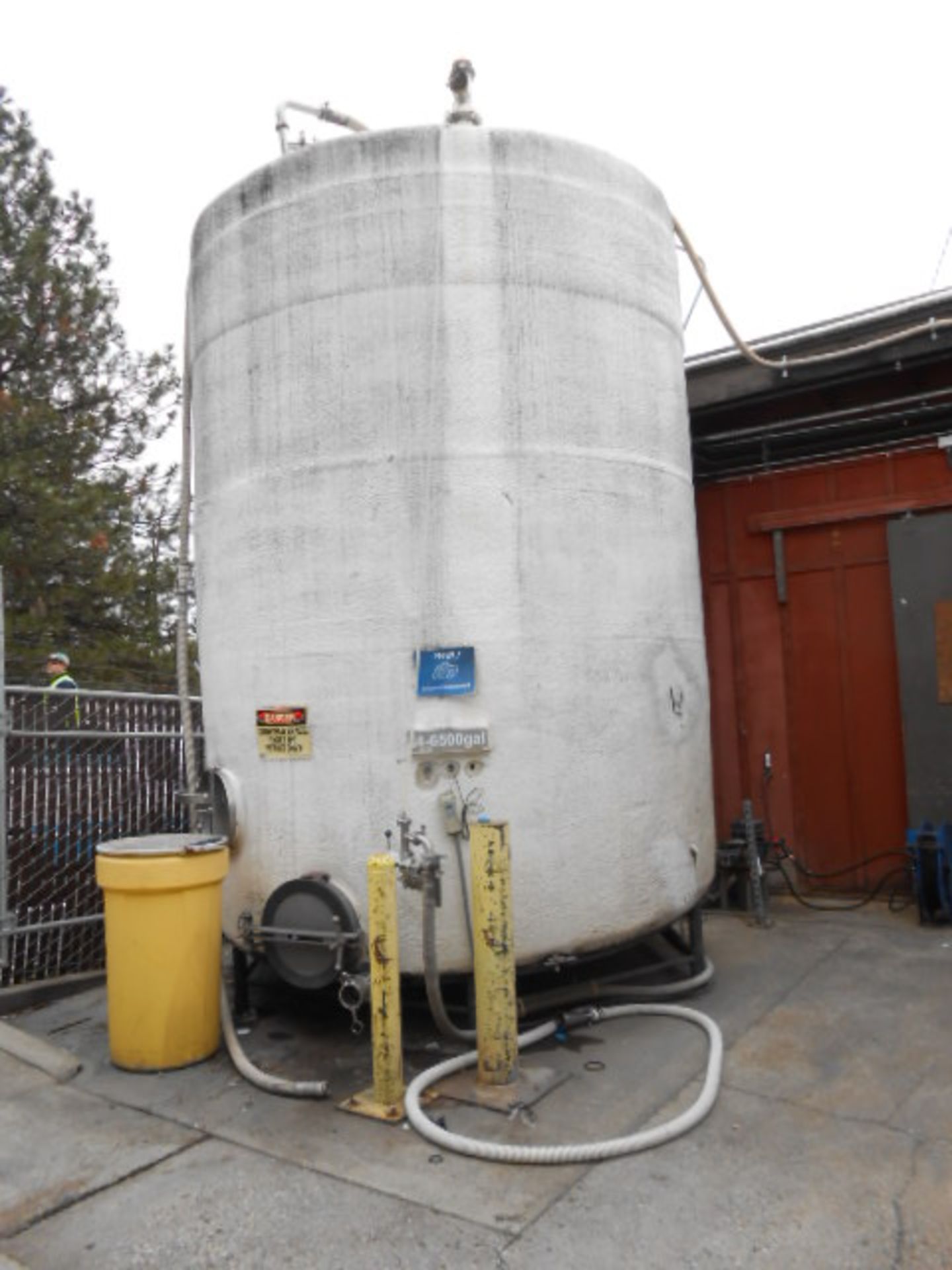 Quality stainless steel waste water tank, 6500 gal, 9 ft diameter x 12 ft __LOCATED: OUTSIDE