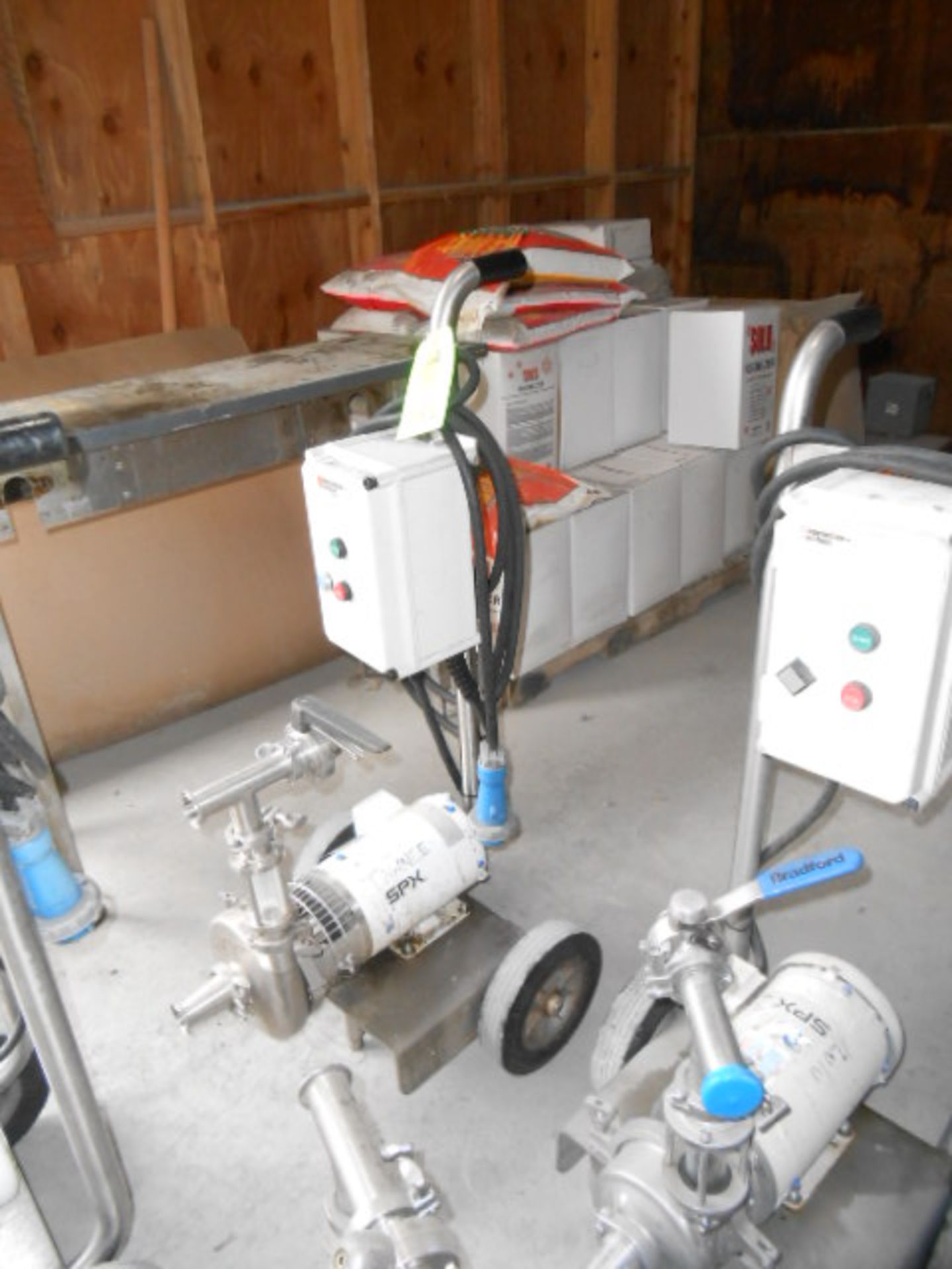 Waukesha pump carts with 3 hp motor, 230/460 vac, tri-clover connection __LOCATED: ON-SITE WAREHOUSE