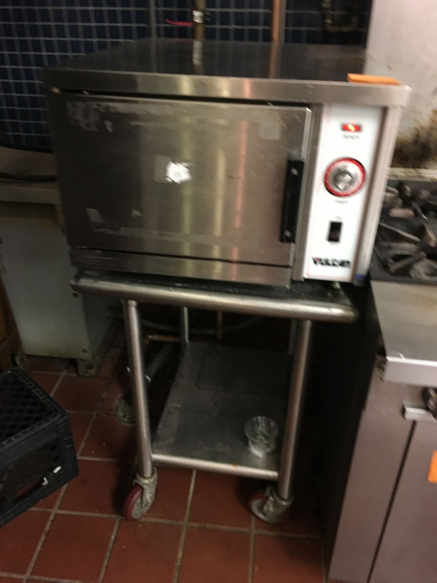 SS Oven, Vulcan, on SS table, 2 x 2 x 4 1/2 (dim. with table) Located: Main Kitchen, adjacent to