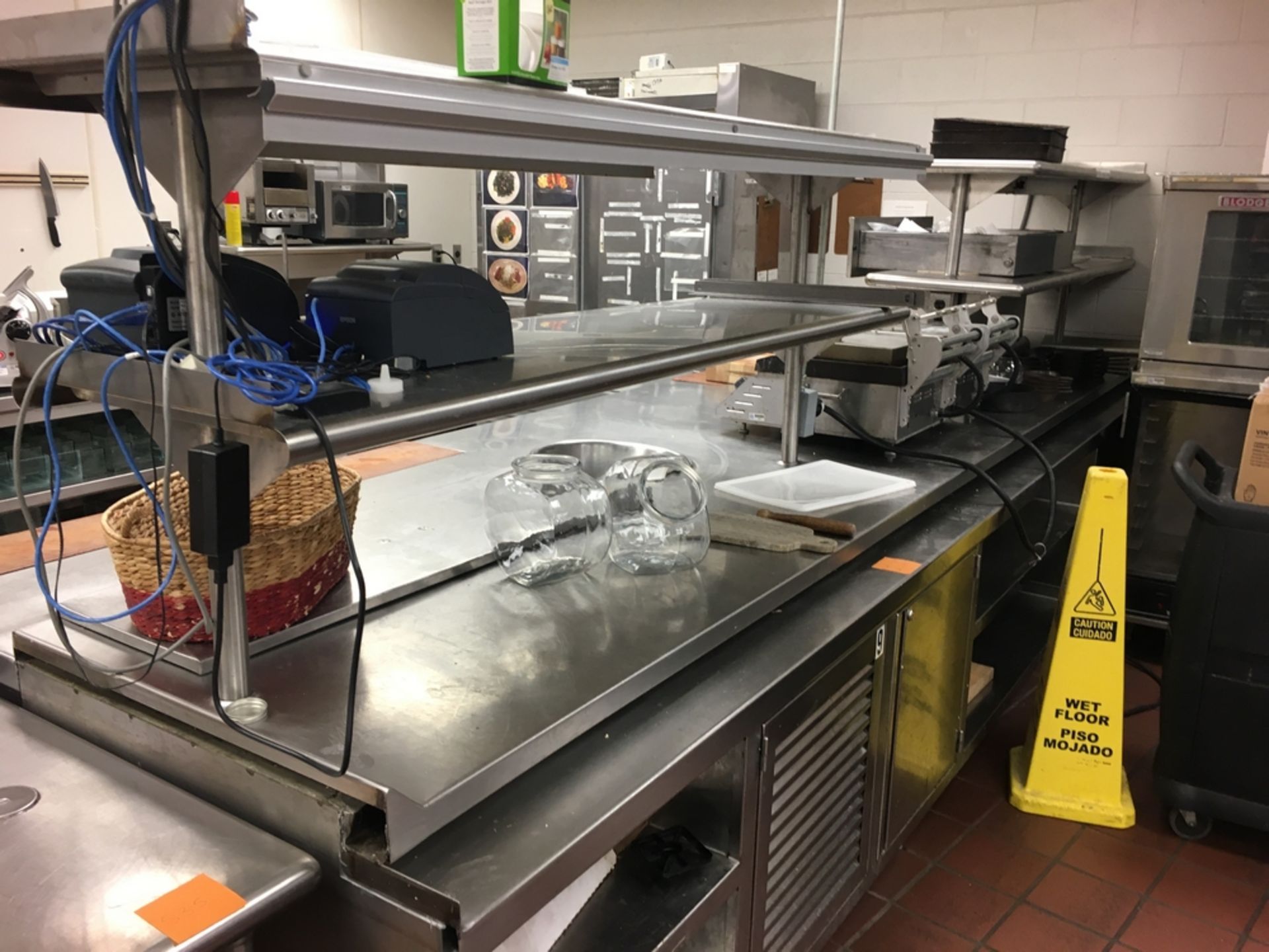 SS Prep Table, 4 1/2 ft w x 15 ft L x 5 1/2 ft t OVERSIZED Located: Main Kitchen, adjacent to Palace