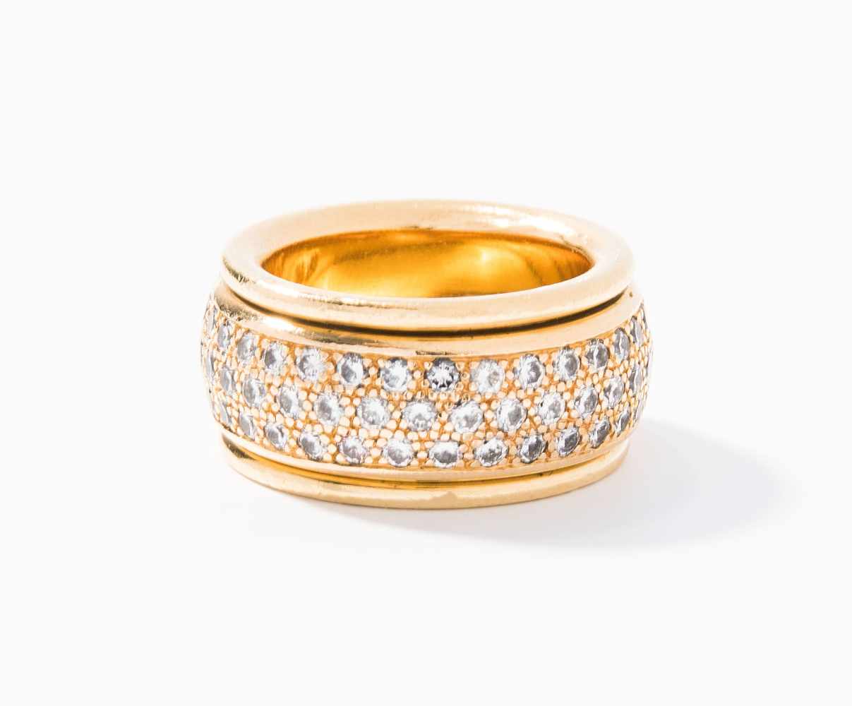 Brillant-Ring750 Gelbgold. Breiter Ring in massiver Goldarbeit mit beweglichen Ring, Brillantpavé