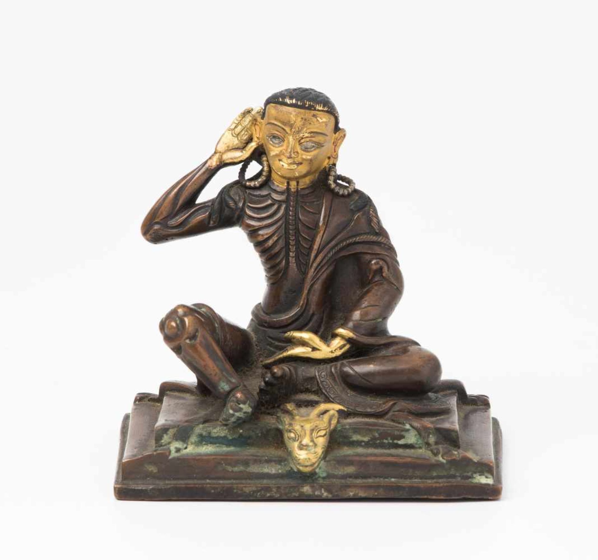 Figur des MilarepaNepal, 20.Jh. Bronze, teilvergoldet. Figur des Gurus Milarepa in seiner