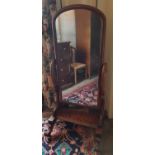 A Victorian Mahogany Cheval Mirror with carved feet and original silver backed glass. H160cm X