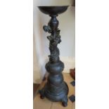 A Japanese Bronze Tripod Stand of baluster form, with a sinuous scaly Dragon on the neck. Meiji.