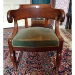 A 19th Century Mahogany Tub/Office Chair with green upholstery.