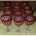 A quantity of Cranberry Glassware.