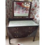 An Edwardian Mahogany Dressing Table with brass ring handles. H150cm X W107cm.