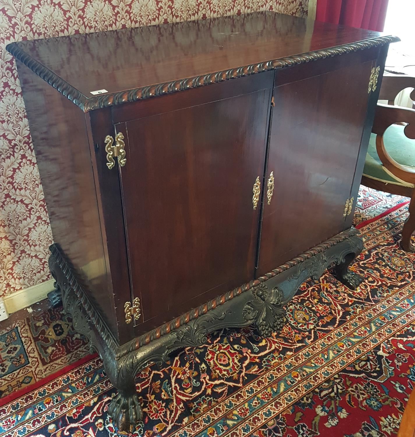 A 19c Mahogany Irish Silver Cabinet, with a highly carved freeze and hairy paw feet. W110cm X H105cm - Image 2 of 2