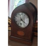 An Edwardian Mahogany Mantel Clock.(with key) H27cm.