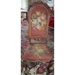 A good 19th Century Oak highly carved high back Chair with tapestry upholstery.
