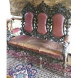 A magnificent 19th Century Irish Oak Hall Seat, with a highly pierced back, front frieze and lions