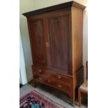 A really fine Regency Mahogany Inlaid Gentleman's Wardrobe. H214cm X W136cm X D65cm.