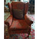 A pair of Wingback Armchairs along with an easy Armchair.