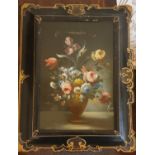 An unusual 19th Century Oil on Board Still Life of Flowers in a painted and ebonised gilt frame.