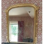 A good Victorian timber gilt Arch top Overmantle Mirror with roped edge carving and pillered