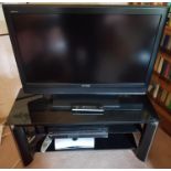 A Sony Bravia 37" Television on stand.