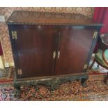 A 19c Mahogany Irish Silver Cabinet, with a highly carved freeze and hairy paw feet. W110cm X H105cm
