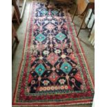 A beautiful Iranian Runner with a bespoke all over woven design. L315cm X W120cm.