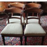 A nice set of four William 1Vth Mahogany Dining Chairs with carved backs.