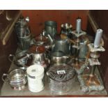 A quantity of Silver Plated Items in the right hand cupboard of sideboard.