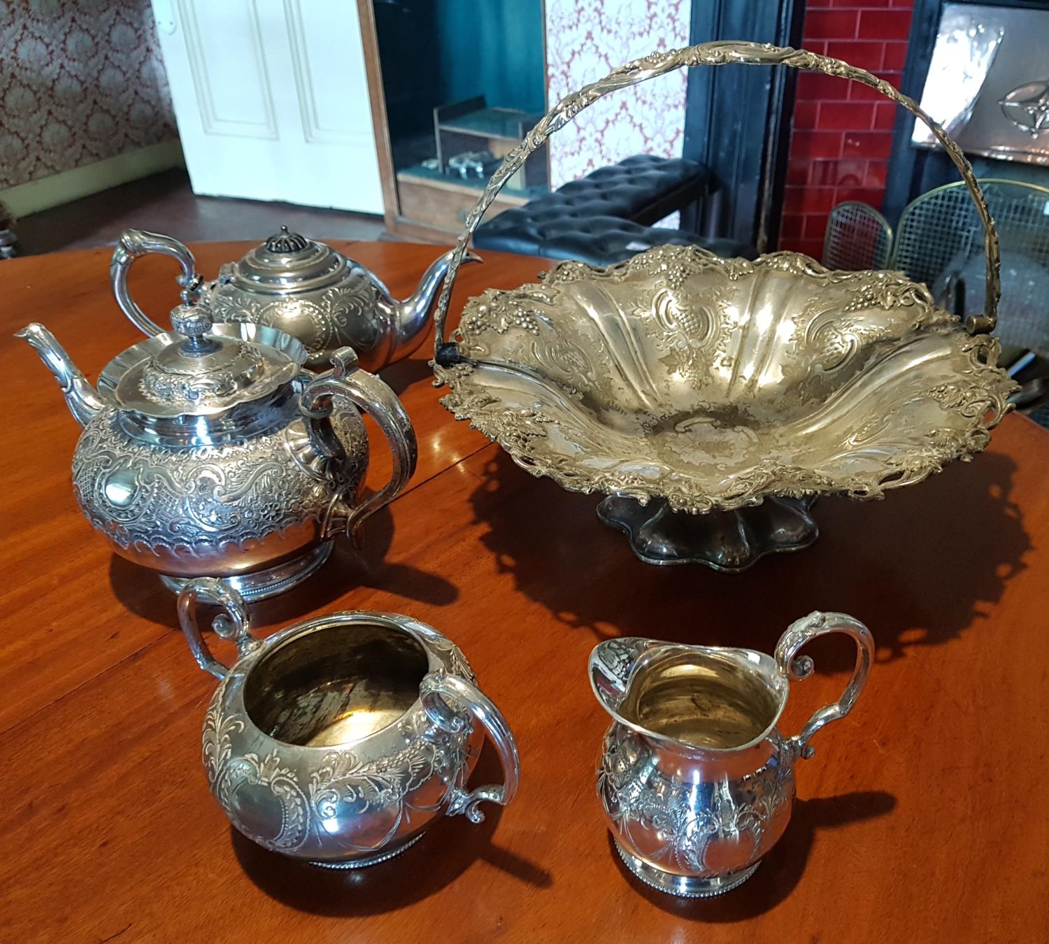 A 19th Century Silver Plated Teaset along with a Silver Plated Centre Basket.