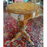 A good 19th Century Walnut Work Table on tripod supports with a sewing interior and a chessboard