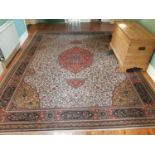 A fantastic Cream ground Rug with allover decoration and multi borders. 366cm X 276cm