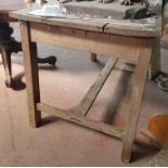 A stripped Pine Kitchen Table.