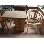 A nice Early 20th Century Kneehole Desk along with a similar bucket Office Chair.